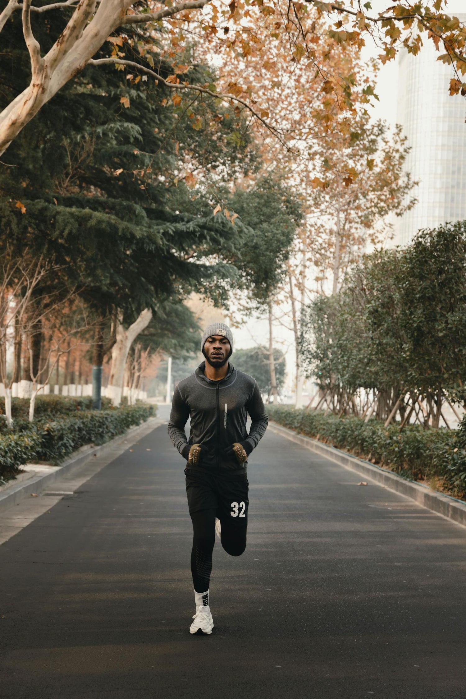 Boxer running at dawn in winter gear, embodying early morning discipline and the mindset of a future champion—part of the Fereli Code and boxing workout equipment journey.