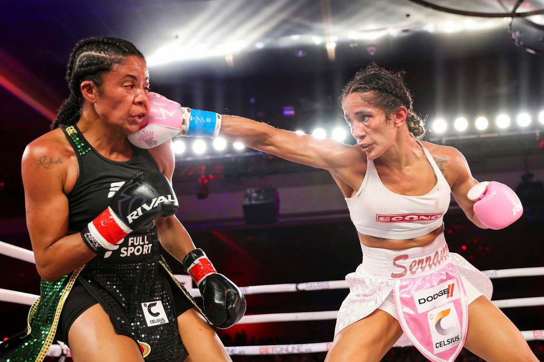 Amanda Serrano lands a powerful right cross on her opponent during a professional boxing match.