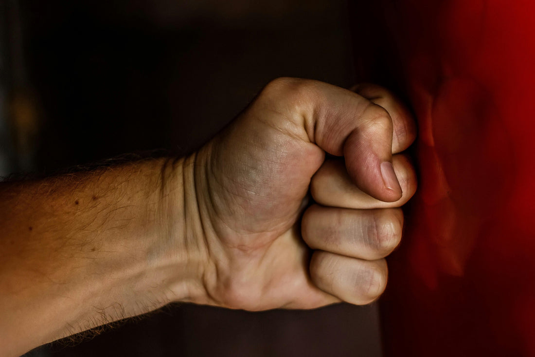 Bare fist showing correct knuckle alignment used in boxing gloves and punching mechanics to demonstrate proper punching technique.