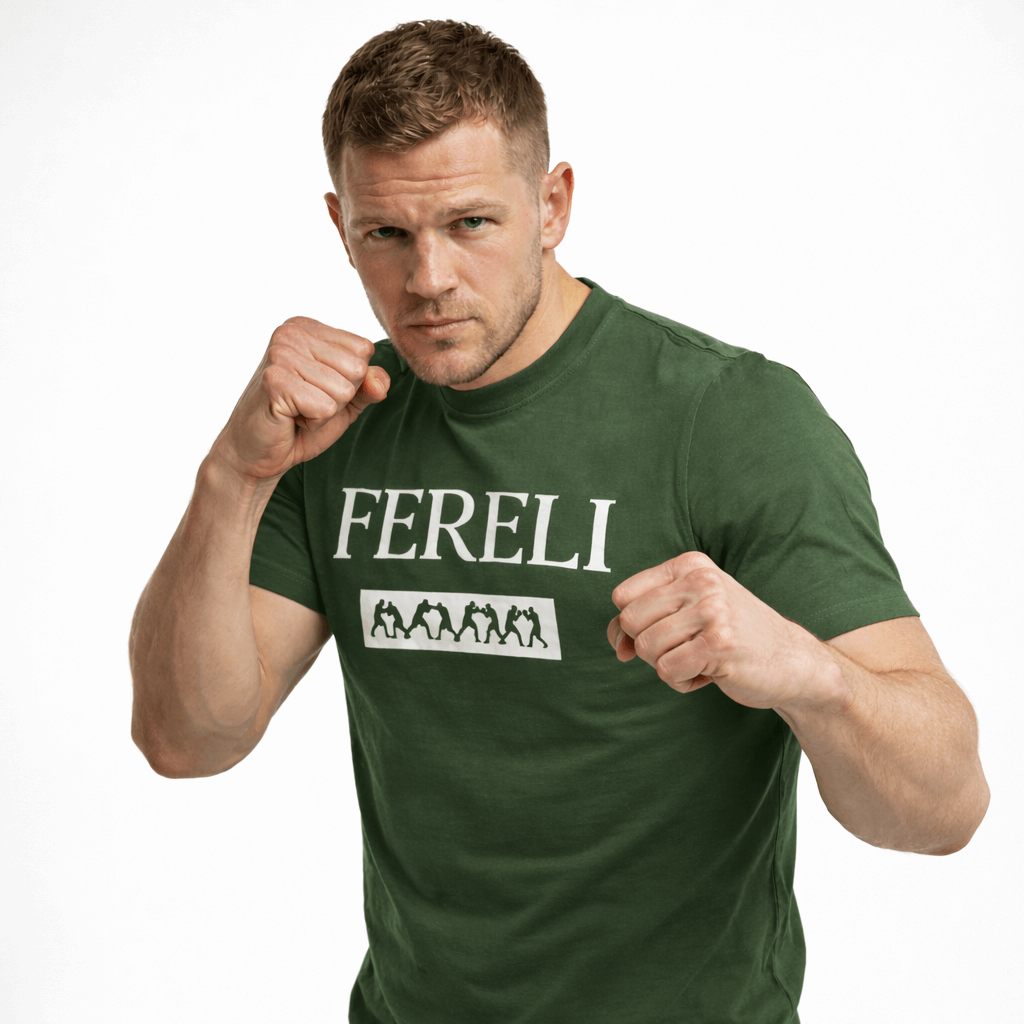 Model wearing the Fereli Covenant T-Shirt in a fighting stance, showcasing a luxury combat lifestyle t-shirt designed for elevated fightwear and heritage-inspired athletic style.