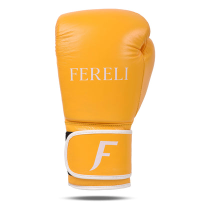 Close-up of Fereli Emberlight yellow 8 oz leather boxing gloves with strap closure. Minimalist design ideal for kickboxing and training with simple boxing glove aesthetics.