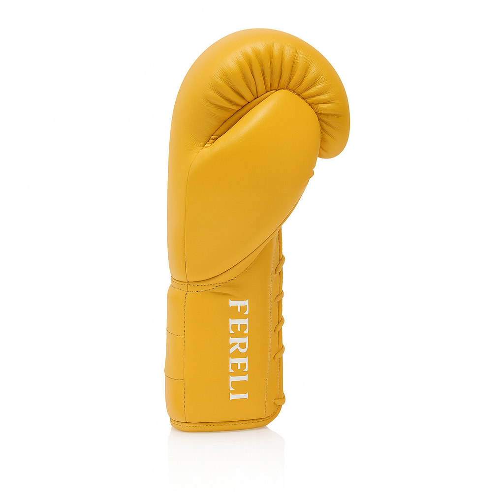 Side view of Fereli Emberlight 8 oz leather kickboxing glove in gold, featuring a simple boxing glove design with white logo and lace-up closure.
