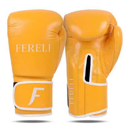 Fereli Emberlight strap boxing gloves in yellow leather, designed as simple boxing gloves for training and sparring. Ideal 8 oz leather boxing gloves for kickboxing or boxing beginners.