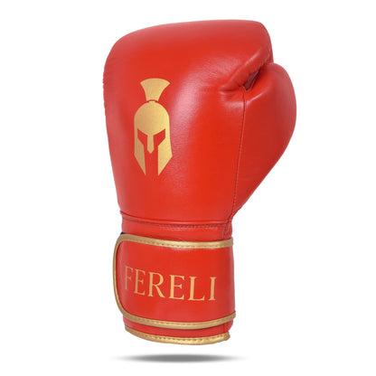Side profile of Fereli Ludus red boxing glove with golden Spartan helmet logo and gold-trimmed strap – premium boxing gloves for kickboxing from our boxing gear sale and boxing equipment online collection