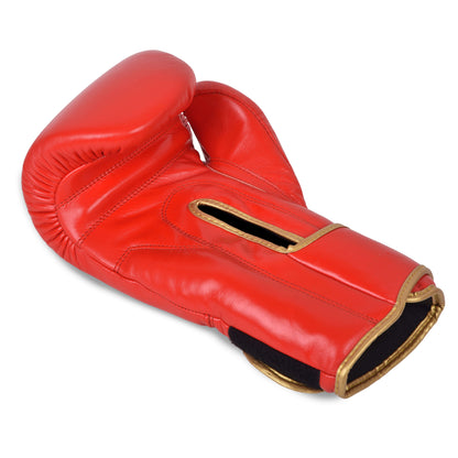 Angled palm-side view of Fereli Ludus red boxing glove showing ventilated wrist slit and ergonomic contour — ideal boxing gloves for kickboxing, featured in our boxing gear sale and boxing equipment online collection