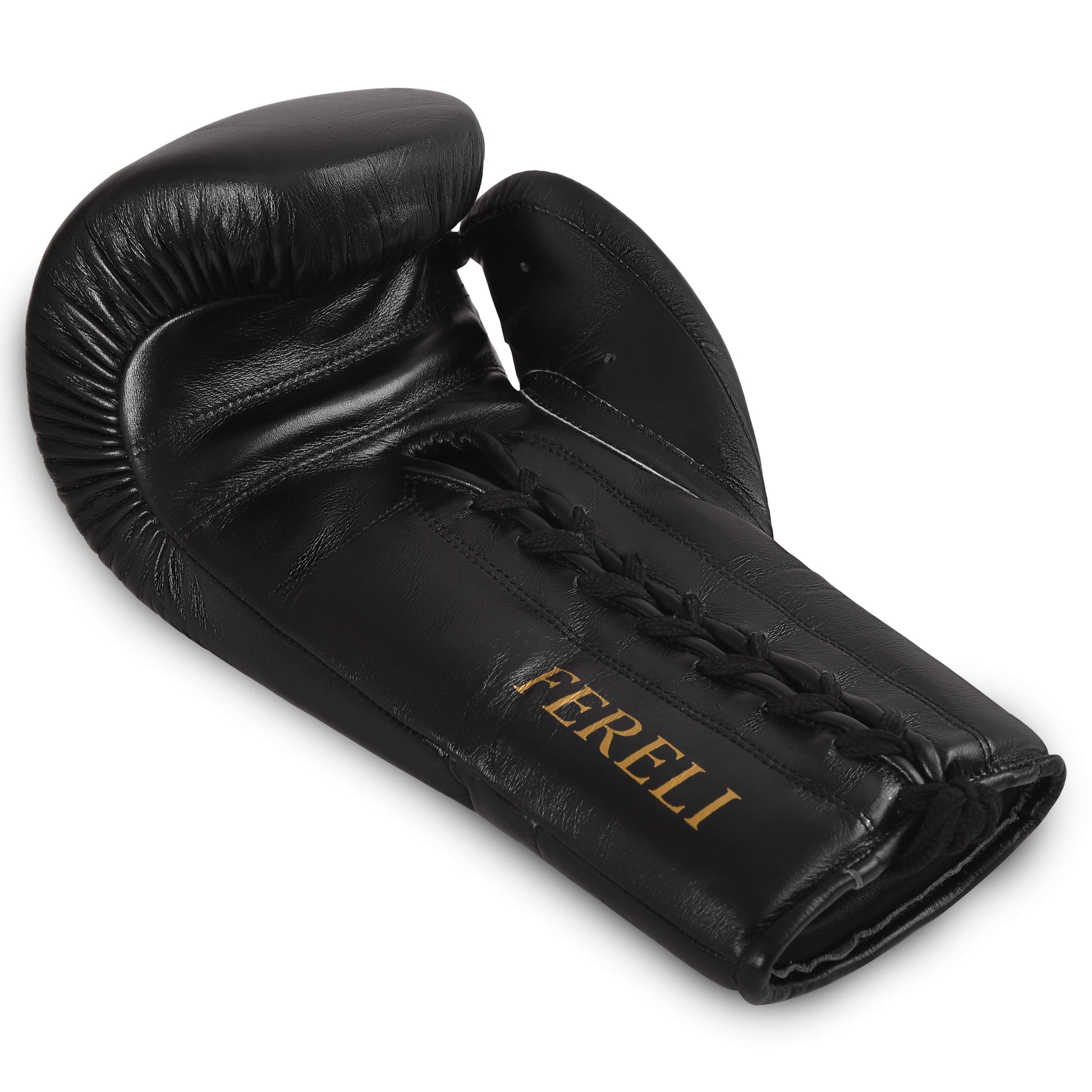 Angled view of Fereli Phantom black lace-up boxing glove with foam padding, ideal beginner boxing equipment and durable for kickboxing sparring.
