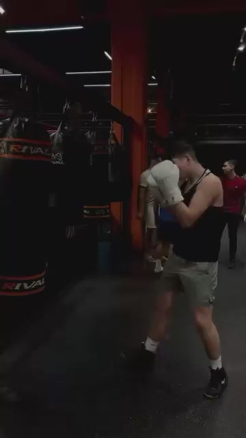 An amateur boxer using Fereli Aether on the heavy bag.