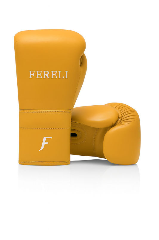 Fereli Emberlight simple boxing gloves in golden leather finish, ideal for 8 oz leather kickboxing gloves and beginner training.
